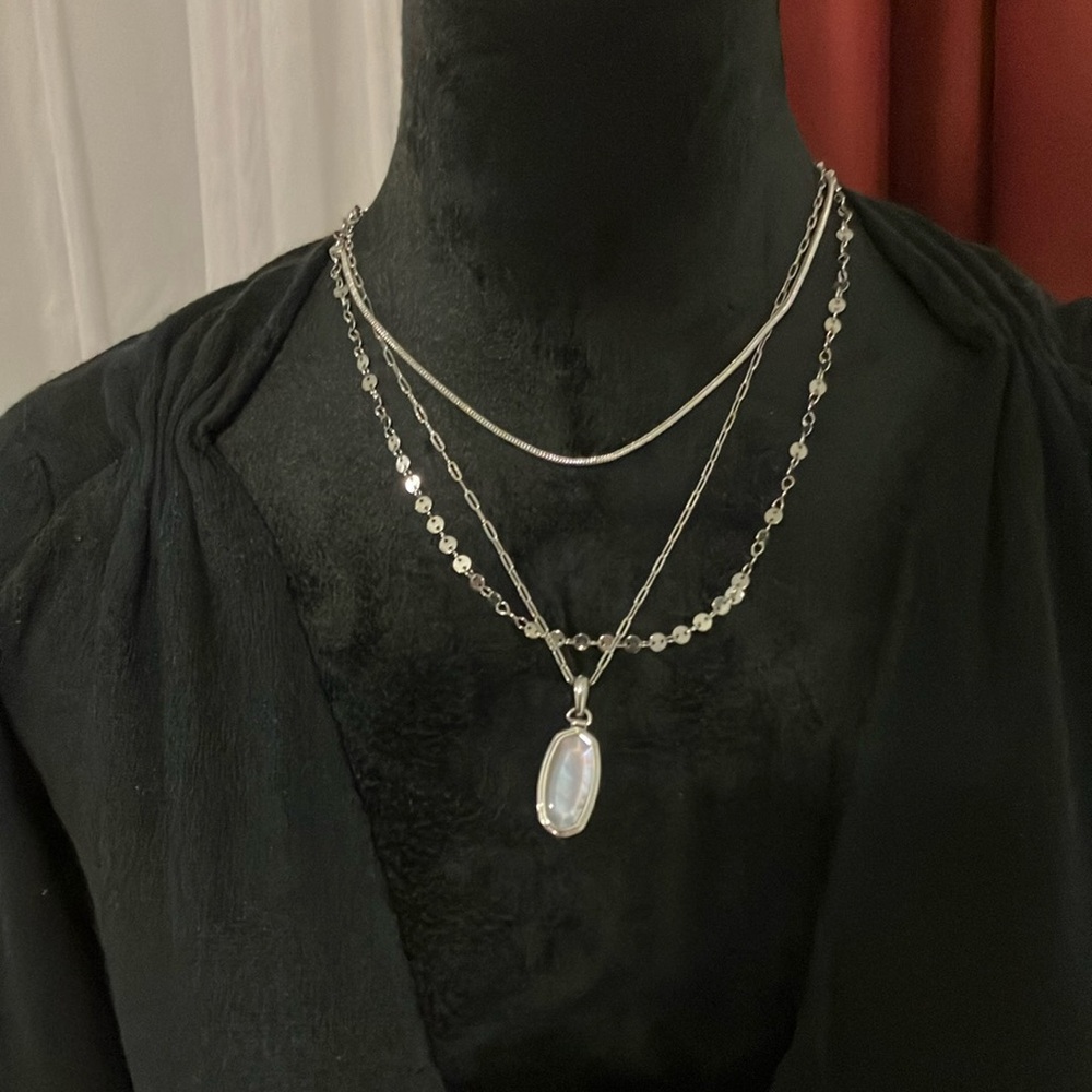 This unique piece has three separate necklaces in one.